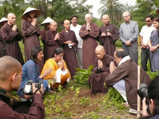 Thich Nhat Hanh planting a Banyan tree at Jamun Village